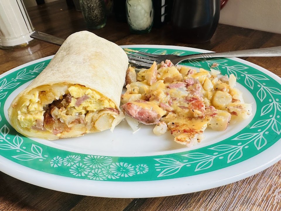 Menu page listing soups, burgers, and breakfast