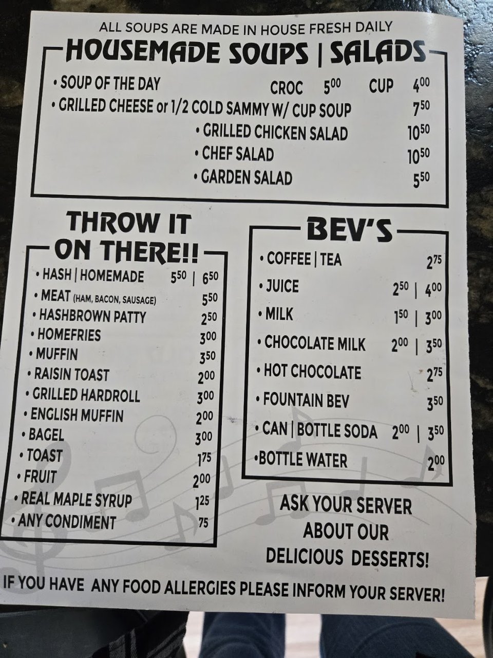 Printed diner menu with sandwiches and eggs